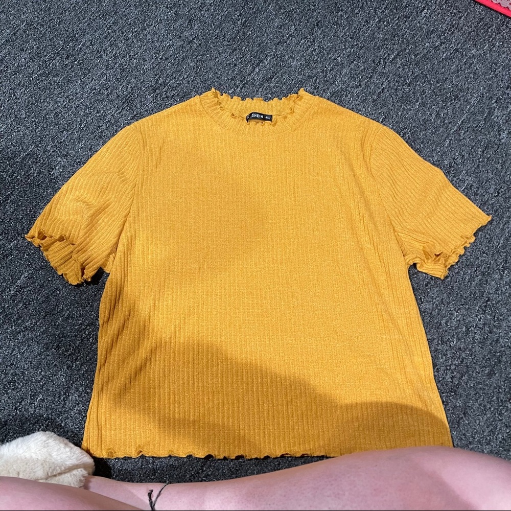 Mustard yellow mock neck lettuce hem top